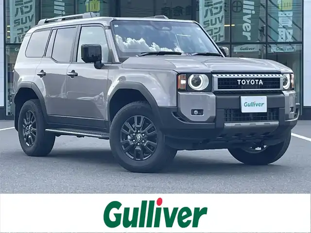 トヨタ ランドクルーザー ２５０ VX 岡山県 2024(令6)年 2.3万km アバンギャルドブロンズメタリック 登録時走行距離22119km/ワンオーナー/純正12.3インチナビ/フルセグTV(AM.FM.TV.BT)/サンルーフ/全方位カメラ/ETC2.0/ブラインドスポットモニター/デジタルインナーミラー/シートヒーター/エアシート/クリアランスソナー/衝突軽減ブレーキ/レーダークルーズコントロール/レーンキープアシスト/オートマチックハイビーム/アイドリングストップ/パワーバックドア/18インチ純正AW/純正フロアマット