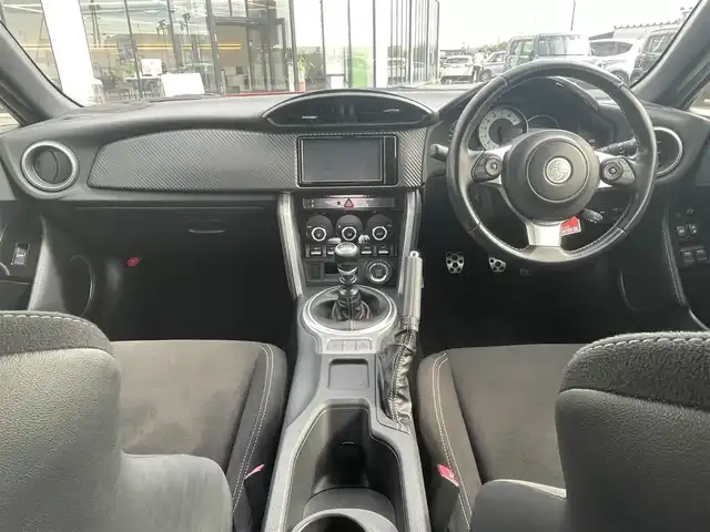 トヨタ ８６ GT 鳥取県 2019(平31)年 2.7万km ピュアレッド ６速ミッション/ワンオーナー/純正ナビ/フルセグ/DVD/CD/BT/バックカメラ・ETC/ＴＲＤエアロ/フロント/リア/サイド/LEDヘットライト/純正フォグライト/純正17インチアルミホイール/ロッソモデロマフラー/プッシュエンジンスタート/横滑り防止装置/スペアキーｘ１/フロアマット・ドアバイザー/保証書/取扱説明書/純正マフラー積込み