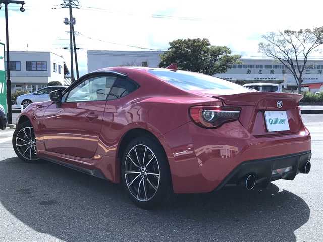 トヨタ ８６ GT 鳥取県 2019(平31)年 2.7万km ピュアレッド ６速ミッション/ワンオーナー/純正ナビ/フルセグ/DVD/CD/BT/バックカメラ・ETC/ＴＲＤエアロ/フロント/リア/サイド/LEDヘットライト/純正フォグライト/純正17インチアルミホイール/ロッソモデロマフラー/プッシュエンジンスタート/横滑り防止装置/スペアキーｘ１/フロアマット・ドアバイザー/保証書/取扱説明書/純正マフラー積込み