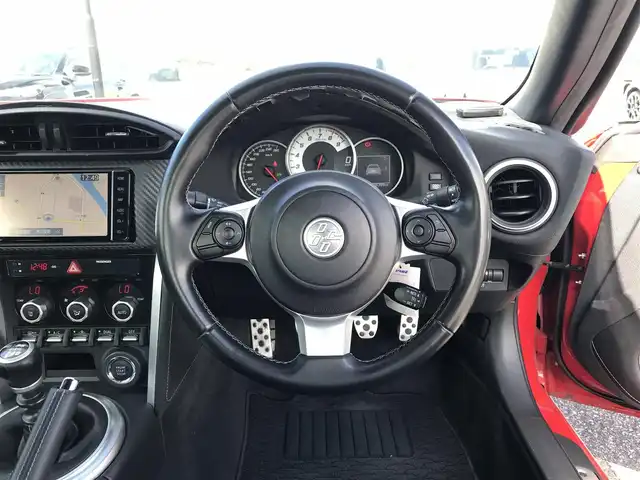 トヨタ ８６ GT 鳥取県 2019(平31)年 2.7万km ピュアレッド ６速ミッション/ワンオーナー/純正ナビ/フルセグ/DVD/CD/BT/バックカメラ・ETC/ＴＲＤエアロ/フロント/リア/サイド/LEDヘットライト/純正フォグライト/純正17インチアルミホイール/ロッソモデロマフラー/プッシュエンジンスタート/横滑り防止装置/スペアキーｘ１/フロアマット・ドアバイザー/保証書/取扱説明書/純正マフラー積込み
