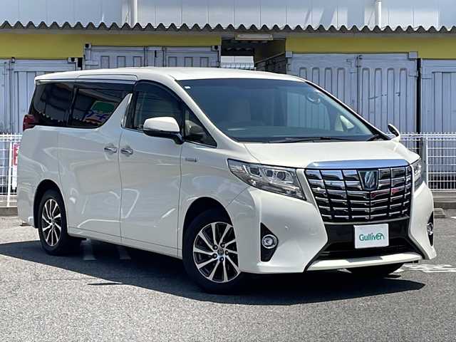 トヨタ アルファードハイブリット G 愛知県 2017(平29)年 8.1万km ラグジュアリーホワイトパールクリスタルシャインガラスフレーク /禁煙車//ALPINE 11インチメモリナビ//フルセグ/CD/DVD/SD/AM//FM/iPod/BT/AUX//H30-R7ディーラー記録簿//ETC//AC100V//アダクティブクルーズコントロール//ウッドコンビステアリング//クリアランスソナー//インテリジェントクリアランスソナー//プリクラッシュセーフティー//ステアリングスイッチ//オートLEDヘッドライト//オートワイパー//フォグランプ//プッシュスタート//サンシェード//純正ドアバイザー/フロアマット//保証書//取扱説明書