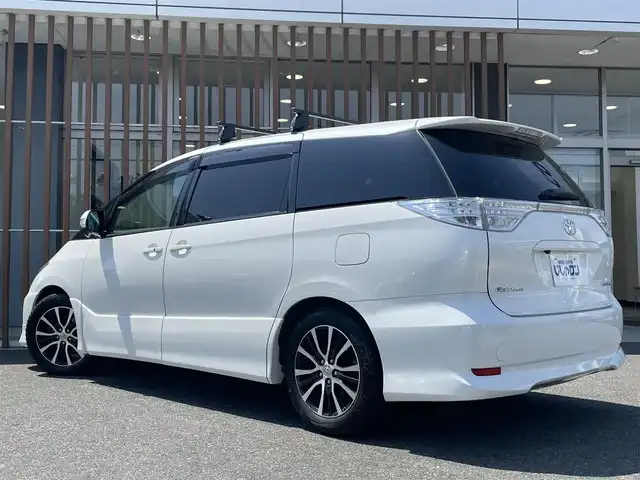 トヨタ エスティマ アエラス 鳥取県 2015(平27)年 11.6万km ホワイトパールクリスタルシャイン (株)IDOMが運営する【じしゃロン鳥取店】の自社ローン専用車両になります。こちらは現金またはオートローンご利用時の価格です。自社ローンご希望の方は別途その旨お申付け下さい/４WD/社外ナビ（AVIC-HRZ0096）/・CD/DVD/・ワンセグTV/バックカメラ/ビルトインETC/フリップダウンモニター/両側パワースライドドア/純正アルミホイール/プッシュスタート/スマートキー/クルーズコントロール/ルーフラック/電動格納ミラー/ドアバイザー/フォグランプ