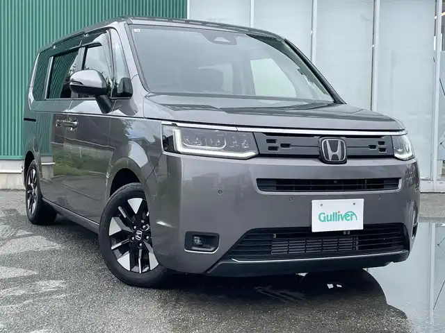 ホンダ ステップワゴン 福岡県 2022(令4)年 1.9万km スーパープラチナグレーメタリック プッシュスタートボタン/スマートキー/クルーズコントロール/純正ナビ/Bluetoothオーディオ/全方位カメラ/フルセグTV/ETC/前方ドライブレコーダー/両側パワースライドドア/純正アルミホイール/SOSコール
