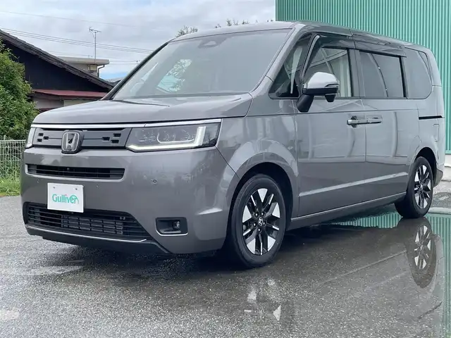 ホンダ ステップワゴン 福岡県 2022(令4)年 1.9万km スーパープラチナグレーメタリック プッシュスタートボタン/スマートキー/クルーズコントロール/純正ナビ/Bluetoothオーディオ/全方位カメラ/フルセグTV/ETC/前方ドライブレコーダー/両側パワースライドドア/純正アルミホイール/SOSコール