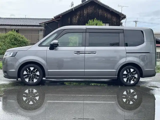 ホンダ ステップワゴン 福岡県 2022(令4)年 1.9万km スーパープラチナグレーメタリック プッシュスタートボタン/スマートキー/クルーズコントロール/純正ナビ/Bluetoothオーディオ/全方位カメラ/フルセグTV/ETC/前方ドライブレコーダー/両側パワースライドドア/純正アルミホイール/SOSコール