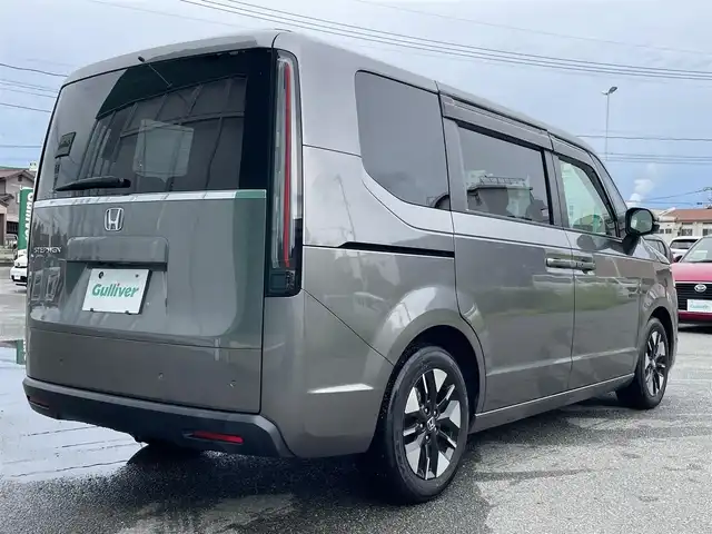 ホンダ ステップワゴン 福岡県 2022(令4)年 1.9万km スーパープラチナグレーメタリック プッシュスタートボタン/スマートキー/クルーズコントロール/純正ナビ/Bluetoothオーディオ/全方位カメラ/フルセグTV/ETC/前方ドライブレコーダー/両側パワースライドドア/純正アルミホイール/SOSコール