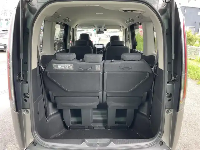 ホンダ ステップワゴン 福岡県 2022(令4)年 1.9万km スーパープラチナグレーメタリック プッシュスタートボタン/スマートキー/クルーズコントロール/純正ナビ/Bluetoothオーディオ/全方位カメラ/フルセグTV/ETC/前方ドライブレコーダー/両側パワースライドドア/純正アルミホイール/SOSコール