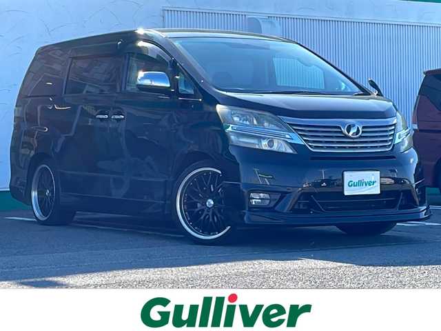 トヨタ ヴェルファイア 2．4Z 徳島県 2009(平21)年 17.8万km ブラック 社外7型SDナビ　AVIC-RZ03/（DISC/USB/SD/BT/ラジオ/フルセグ/iPod/AUX）/バックカメラ/10.2型フリップダウンモニター/後方コーナーセンサー/ETC/キセノンヘッドライト/純正フロアマット/両側電動スライドドア/社外AW/電動格納ミラー/フォグライト/オートライト