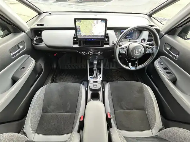 ホンダ フィット RS 愛媛県 2023(令5)年 4.4万km グレー ALPINEフローターナビ(フルセグTV/BT)/ホンダセンシング/バックカメラ/アダプティブクルーズコントロール/車線逸脱防止装置/衝突被害軽減装置/ＬＥＤヘッドライト/オートマチックハイビーム/ETC/ALPINEデジタルインナーミラー/前後ドライブレコーダー/クリアランスソナー/ドアバイザー/電動パーキングブレーキ/ハーフレザーシート/現状サマー(社外AW)(195/45/R17)/TOYO NANOENERGY PlLUS/純正AW付サマータイヤ有/純正テールランプ有/純正フロアマット有/禁煙車