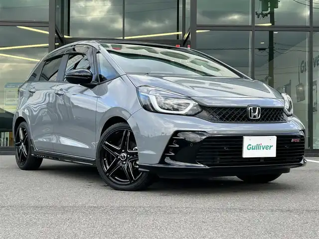 ホンダ フィット RS 愛媛県 2023(令5)年 4.4万km グレー ALPINEフローターナビ(フルセグTV/BT)/ホンダセンシング/バックカメラ/アダプティブクルーズコントロール/車線逸脱防止装置/衝突被害軽減装置/ＬＥＤヘッドライト/オートマチックハイビーム/ETC/ALPINEデジタルインナーミラー/前後ドライブレコーダー/クリアランスソナー/ドアバイザー/電動パーキングブレーキ/ハーフレザーシート/現状サマー(社外AW)(195/45/R17)/TOYO NANOENERGY PlLUS/純正AW付サマータイヤ有/純正テールランプ有/純正フロアマット有/禁煙車