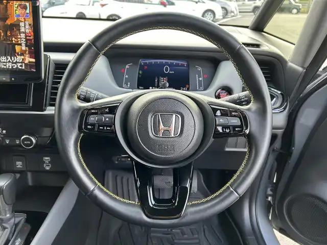 ホンダ フィット RS 愛媛県 2023(令5)年 4.4万km グレー ALPINEフローターナビ(フルセグTV/BT)/ホンダセンシング/バックカメラ/アダプティブクルーズコントロール/車線逸脱防止装置/衝突被害軽減装置/ＬＥＤヘッドライト/オートマチックハイビーム/ETC/ALPINEデジタルインナーミラー/前後ドライブレコーダー/クリアランスソナー/ドアバイザー/電動パーキングブレーキ/ハーフレザーシート/現状サマー(社外AW)(195/45/R17)/TOYO NANOENERGY PlLUS/純正AW付サマータイヤ有/純正テールランプ有/純正フロアマット有/禁煙車