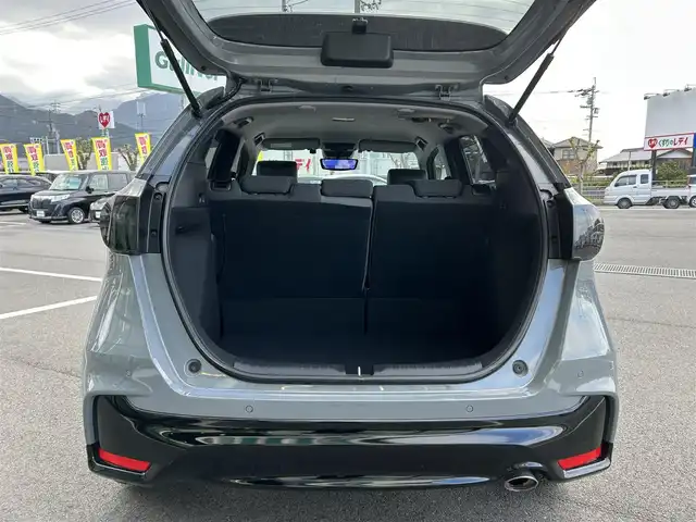 ホンダ フィット RS 愛媛県 2023(令5)年 4.4万km グレー ALPINEフローターナビ(フルセグTV/BT)/ホンダセンシング/バックカメラ/アダプティブクルーズコントロール/車線逸脱防止装置/衝突被害軽減装置/ＬＥＤヘッドライト/オートマチックハイビーム/ETC/ALPINEデジタルインナーミラー/前後ドライブレコーダー/クリアランスソナー/ドアバイザー/電動パーキングブレーキ/ハーフレザーシート/現状サマー(社外AW)(195/45/R17)/TOYO NANOENERGY PlLUS/純正AW付サマータイヤ有/純正テールランプ有/純正フロアマット有/禁煙車