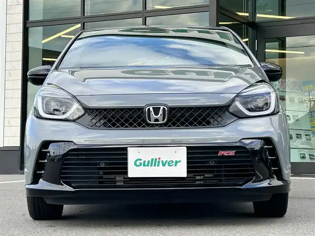 ホンダ フィット RS 愛媛県 2023(令5)年 4.4万km グレー ALPINEフローターナビ(フルセグTV/BT)/ホンダセンシング/バックカメラ/アダプティブクルーズコントロール/車線逸脱防止装置/衝突被害軽減装置/ＬＥＤヘッドライト/オートマチックハイビーム/ETC/ALPINEデジタルインナーミラー/前後ドライブレコーダー/クリアランスソナー/ドアバイザー/電動パーキングブレーキ/ハーフレザーシート/現状サマー(社外AW)(195/45/R17)/TOYO NANOENERGY PlLUS/純正AW付サマータイヤ有/純正テールランプ有/純正フロアマット有/禁煙車