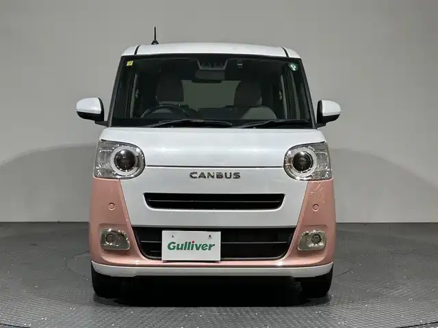 ダイハツ ムーヴ キャンバス ストライプス G 愛媛県 2022(令4)年 0.7万km シャイニングホワイトパール/アプリコットピンクメタリック ・スマートアシスト/・レーンアシスト/・純正メモリーナビ/・Bluetooth/フルセグテレビ/DVD/・バックカメラ/・ドライブレコーダー/・ETC/・両側パワースライドドア/・LEDヘッドライト/・シートヒーター/・スマートキー