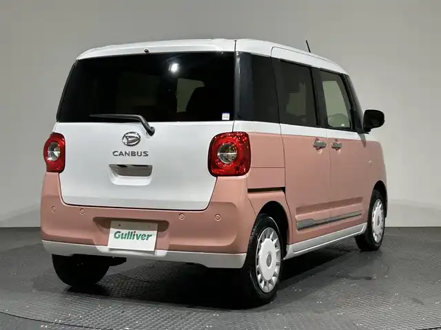 ダイハツ ムーヴ キャンバス ストライプス G 愛媛県 2022(令4)年 0.7万km シャイニングホワイトパール/アプリコットピンクメタリック ・スマートアシスト/・レーンアシスト/・純正メモリーナビ/・Bluetooth/フルセグテレビ/DVD/・バックカメラ/・ドライブレコーダー/・ETC/・両側パワースライドドア/・LEDヘッドライト/・シートヒーター/・スマートキー