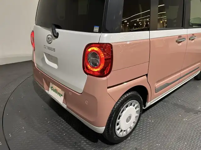 ダイハツ ムーヴ キャンバス ストライプス G 愛媛県 2022(令4)年 0.7万km シャイニングホワイトパール/アプリコットピンクメタリック ・スマートアシスト/・レーンアシスト/・純正メモリーナビ/・Bluetooth/フルセグテレビ/DVD/・バックカメラ/・ドライブレコーダー/・ETC/・両側パワースライドドア/・LEDヘッドライト/・シートヒーター/・スマートキー