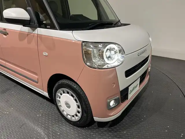 ダイハツ ムーヴ キャンバス ストライプス G 愛媛県 2022(令4)年 0.7万km シャイニングホワイトパール/アプリコットピンクメタリック ・スマートアシスト/・レーンアシスト/・純正メモリーナビ/・Bluetooth/フルセグテレビ/DVD/・バックカメラ/・ドライブレコーダー/・ETC/・両側パワースライドドア/・LEDヘッドライト/・シートヒーター/・スマートキー