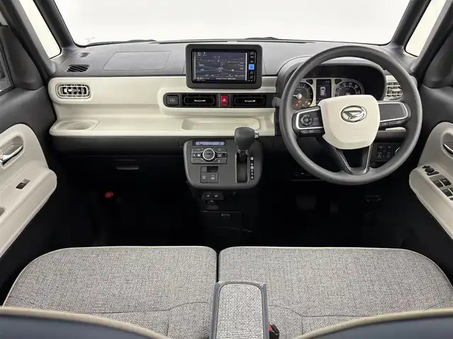 ダイハツ ムーヴ キャンバス ストライプス G 福岡県 2022(令4)年 0.7万km シャイニングホワイトパール/アプリコットピンクメタリック 純正ナビ／フルセグＴＶ　/バックカメラ　/ホッとカップホルダー　/ＥＴＣ　/ドラレコ　/コーナーセンサー　/スマートアシスト　/衝突軽減ブレーキ　/レーンキープ　/アイドリングストップ　/両側電動スライドドア　/シートヒーター　/ＬＥＤヘッドライト
