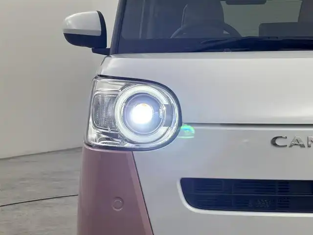 ダイハツ ムーヴ キャンバス ストライプス G 福岡県 2022(令4)年 0.7万km シャイニングホワイトパール/アプリコットピンクメタリック 純正ナビ／フルセグＴＶ　/バックカメラ　/ホッとカップホルダー　/ＥＴＣ　/ドラレコ　/コーナーセンサー　/スマートアシスト　/衝突軽減ブレーキ　/レーンキープ　/アイドリングストップ　/両側電動スライドドア　/シートヒーター　/ＬＥＤヘッドライト