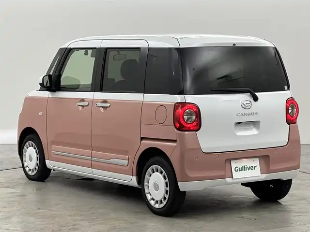 ダイハツ ムーヴ キャンバス ストライプス G 福岡県 2022(令4)年 0.7万km シャイニングホワイトパール/アプリコットピンクメタリック 純正ナビ／フルセグＴＶ　/バックカメラ　/ホッとカップホルダー　/ＥＴＣ　/ドラレコ　/コーナーセンサー　/スマートアシスト　/衝突軽減ブレーキ　/レーンキープ　/アイドリングストップ　/両側電動スライドドア　/シートヒーター　/ＬＥＤヘッドライト