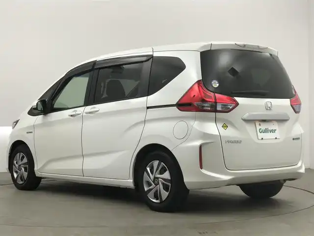 ホンダ フリード ハイブリット G ホンダセンシング 愛知県 2017(平29)年 5万km ホワイトオーキッドパール 純正SDナビ/（BT/DVD/CD/AM/FM/ワンセグTV）/バックカメラ/レーダークルーズコントロール/衝突軽減ブレーキ/路外逸脱抑制機能/両側パワースライドドア/ビルトインETC/LEDライト/ダブル＋サイドエアバッグ/カーテンエアバック