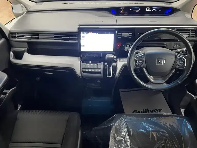 ホンダ ステップワゴン スパーダ ホンダセンシング 道央・札幌 2019(令1)年 5.3万km プレミアムスパークルブラックパール 4WD/ワンーナー/寒冷地仕様/両側パワースライドドア/純正SDナビ/・フルセグTV/CD/DVD/BT/SD/USB/バックカメラ/ホンダセンシング/・衝突軽減ブレーキ/・誤発進抑制機能/・路外逸脱抑制機能/・先行車発進お知らせ機能/・標識認識機能/横滑り防止装置/純正エンジンスターター/純正ドライブレコーダー/アダプティブクルーズコントロール/ビルトインETC/パドルシフト/ステアリングリモコン/純正フロアマット/純正ドアバイザー/オートライト/LEDヘッドライト/フォグライト/ウインカーミラー/純正16インチAW/わくわくゲート/新車時保証書/取扱説明書/ナビ取扱説明書