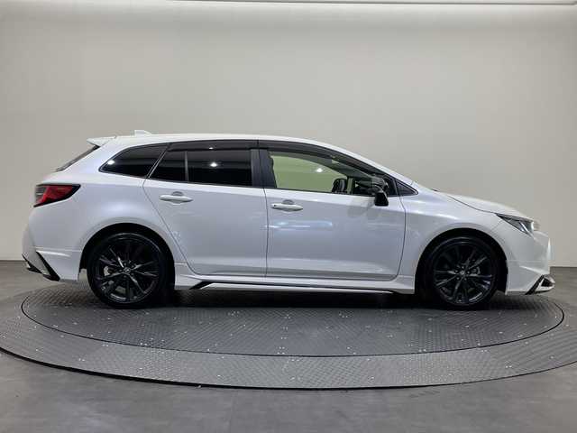 トヨタ カローラツーリング ハイブリッド ダブルバイビー 愛媛県 2020(令2)年 1.3万km ホワイトパールクリスタルシャイン 純正ナビ/Ｂｌｕｅｔｏｏｔｈ／ＵＳＢ/バックカメラ/衝突軽減ブレーキ/レーダークルーズコントロール/ＥＴＣ２．０/全方位ドライブレコーダー/モデリスタエアロ/前後コーナーセンサー/レーンキープアシスト/オートマチックハイビーム/LEDヘッドライト