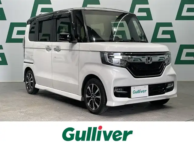 ホンダ Ｎ ＢＯＸ カスタム G L 鹿児島県 2018(平30)年 7.7万km プラチナホワイトパール 禁煙車/社外SDナビ/　・Bluetooth/　・フルセグTV/　・CD/　・DVD/　・iPod/　・USB/　・AM/FM/チップアップシート/片側パワースライドドア/後席サンシェード/バックカメラ/ETC/USB充電ソケット/純正フロアマット/純正アルミホイール/電動格納ミラー/ステアリングリモコン