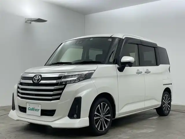 トヨタ ルーミー カスタムG－T 岡山県 2022(令4)年 3.2万km パールホワイトⅢ 純正９インチナビ/【Bluetooth/フルセグTV/CD】/衝突軽減ブレーキシステム/両側電動スライドドア/追従型クルーズコントロール/全方位カメラ/ビルトインＥＴＣ/ＬＥＤヘッドライト/オートハイビーム/LEDフォグランプ/社外ドライブレコーダー（前後）/コーナーセンサー（前後）/踏み間違い防止/オートブレーキホールド/ISOFIX/後席サンシェイド/ステアリングスイッチ/シートリフター/ウインカーミラー/ドアバイザー
