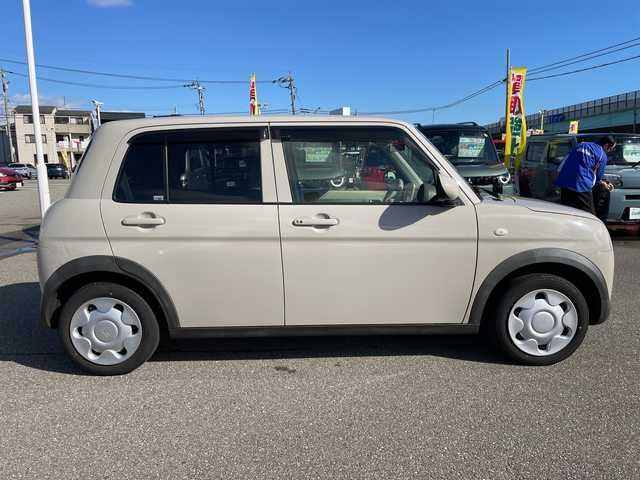 スズキ ラパン L 石川県 2022(令4)年 5.6万km ベージュ 純正８型ナビ　フルセグＴＶ　全方位カメラ　シートヒーター　スマートキー　プッシュスタート　電動ミラー　ベンチシート　スズキセーフティ　クリアランスソナー