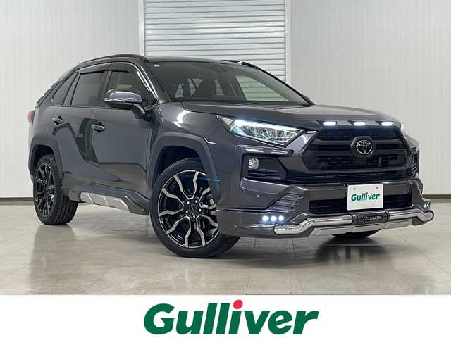 トヨタ ＲＡＶ４ アドベンチャー 熊本県 2021(令3)年 2.7万km グレーメタリック JAOSエアロ、ホイール/純正ディスプレイオーディオ（ラジオ、ナビ、BT、USB）/ETC/バックカメラ/レーダークルーズコントロール/パワーバックドア/ステアリングリモコン/シートヒーター、クーラー/ハンドルヒーター/オートハイビーム/・オートライト/・LEDヘッドライト/・フォグランプ/レーンキープアシスト/BSM/PCS/クリアランスソナー/横滑り防止/プッシュスタート/リモコンスターターのみ/フロアマット/ドアバイザー
