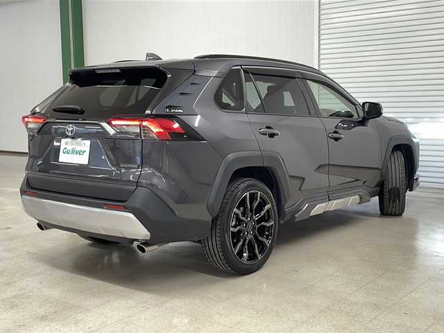 トヨタ ＲＡＶ４ アドベンチャー 熊本県 2021(令3)年 2.7万km グレーメタリック JAOSエアロ、ホイール/純正ディスプレイオーディオ（ラジオ、ナビ、BT、USB）/ETC/バックカメラ/レーダークルーズコントロール/パワーバックドア/ステアリングリモコン/シートヒーター、クーラー/ハンドルヒーター/オートハイビーム/・オートライト/・LEDヘッドライト/・フォグランプ/レーンキープアシスト/BSM/PCS/クリアランスソナー/横滑り防止/プッシュスタート/リモコンスターターのみ/フロアマット/ドアバイザー