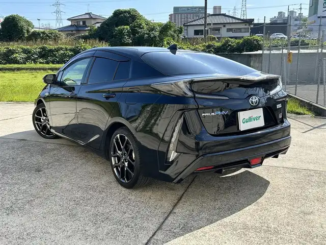 トヨタ プリウス ＰＨＶ Sナビパッケージ・GRスポーツ 長崎県 2019(令1)年 9.5万km アティチュードブラックマイカ 純正11.6インチナビ/（BT/フルセグ）/バックカメラ/衝突軽減システム/レーンアシスト/レーダークルーズ/ETC2.0/ステアリングスイッチ/ハーフレザーシート/シートヒーター/スマートキー/プッシュスタート/純正18インチAW