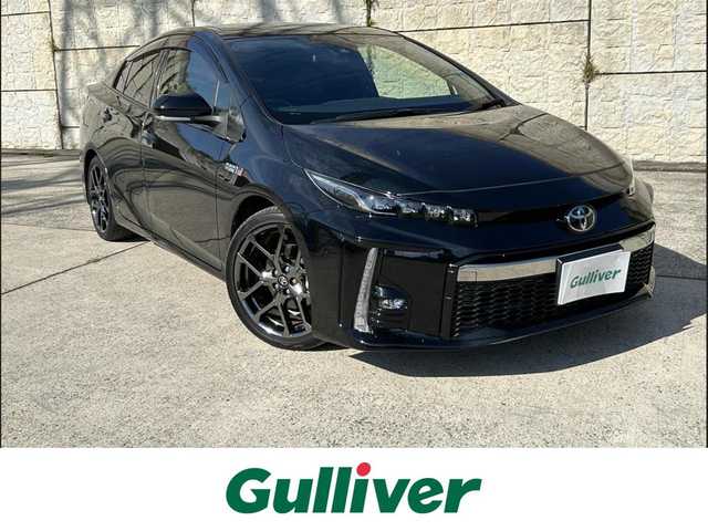 トヨタ プリウス ＰＨＶ Sナビパッケージ・GRスポーツ 長崎県 2019(令1)年 9.5万km アティチュードブラックマイカ 純正11.6インチナビ/（BT/フルセグ）/バックカメラ/衝突軽減システム/レーンアシスト/レーダークルーズ/ETC2.0/ステアリングスイッチ/ハーフレザーシート/シートヒーター/スマートキー/プッシュスタート/純正18インチAW