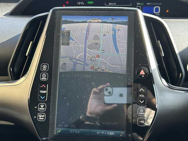 トヨタ プリウス ＰＨＶ Sナビパッケージ・GRスポーツ 長崎県 2019(令1)年 9.5万km アティチュードブラックマイカ 純正11.6インチナビ/（BT/フルセグ）/バックカメラ/衝突軽減システム/レーンアシスト/レーダークルーズ/ETC2.0/ステアリングスイッチ/ハーフレザーシート/シートヒーター/スマートキー/プッシュスタート/純正18インチAW