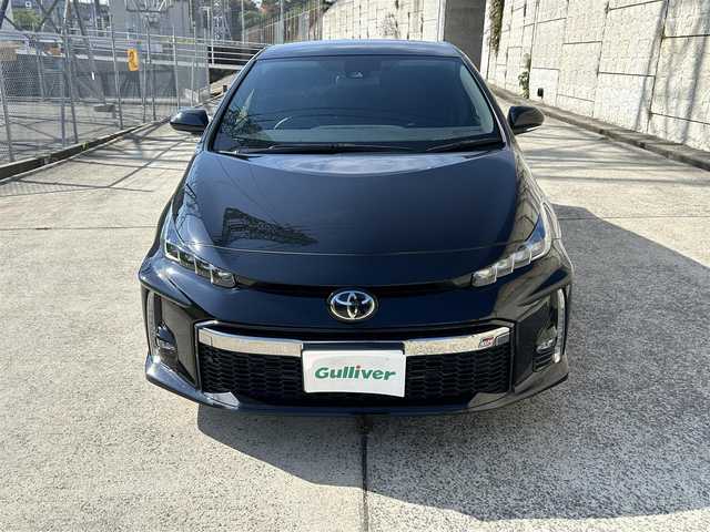 トヨタ プリウス ＰＨＶ Sナビパッケージ・GRスポーツ 長崎県 2019(令1)年 9.5万km アティチュードブラックマイカ 純正11.6インチナビ/（BT/フルセグ）/バックカメラ/衝突軽減システム/レーンアシスト/レーダークルーズ/ETC2.0/ステアリングスイッチ/ハーフレザーシート/シートヒーター/スマートキー/プッシュスタート/純正18インチAW