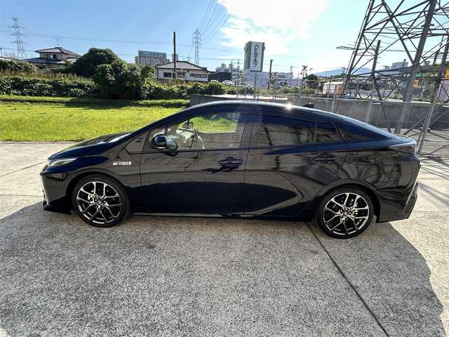 トヨタ プリウス ＰＨＶ Sナビパッケージ・GRスポーツ 長崎県 2019(令1)年 9.5万km アティチュードブラックマイカ 純正11.6インチナビ/（BT/フルセグ）/バックカメラ/衝突軽減システム/レーンアシスト/レーダークルーズ/ETC2.0/ステアリングスイッチ/ハーフレザーシート/シートヒーター/スマートキー/プッシュスタート/純正18インチAW