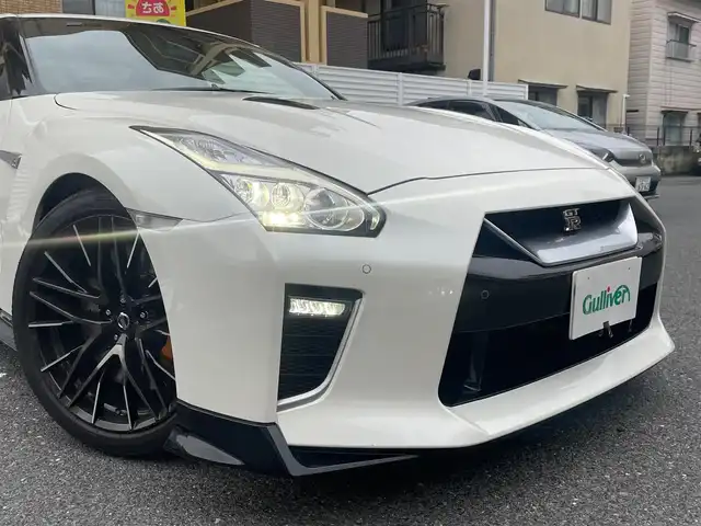 日産 ＧＴ－Ｒ ピュアエディション 広島県 2021(令3)年 0.5万km ブリリアントホワイトパール 純正メモリナビ/ (CD/DVD/BT/USB/フルセグTV)/バックカメラ/ハーフレザーシート/前席パワーシート/クルーズコントロール/パドルシフト/MTモード付AT/プッシュスタート/スマートキー/スペアキー/純正20インチAW/純正LEDヘッドライト/横滑り防止装置/ナビ取扱説明書/取扱説明書/保証書