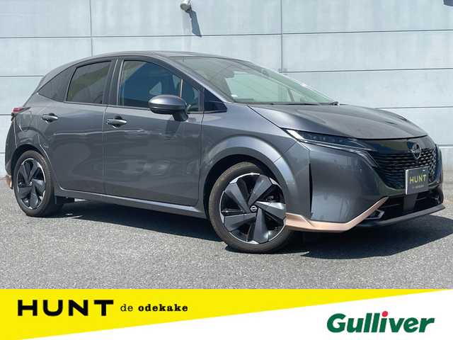 日産 オーラ G レザーエディション 千葉県 2022(令4)年 1.1万km ダークメタルグレー 全方位運転支援システム/　衝突軽減ブレーキ/レーンキープアシスト/　レーダークルーズコントロール/アダプティブヘッドライト/　クリアランスソナー/ブラインドスポットモニター/純正ナビ(MM222D-L)/　フルセグ/BT/USB/カープレイ/アラウンドビューモニター/デジタルインナーミラー/電動パーキングブレーキ/ブレーキホールド/ステアリングスイッチ/ETC/LEDヘッドライト/オートライト/フォグライト/スマートキー/プッシュスタート/純正フロアマット/純正17インチAW