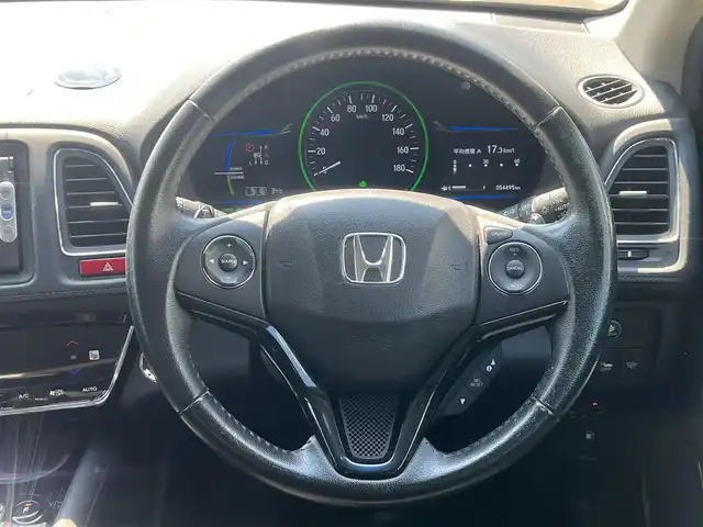 ホンダ ヴェゼル ハイブリッド X 秋田県 2014(平26)年 5.5万km ミスティックグリーンパール ４WD/LEDヘッドライト/衝突軽減システム/純正ナビ/ワンセグ/バックカメラ/純正アルミ/スマートキー/アイドリングストップ/パーキングアシスト/プッシュスタート/クルーズコントロール/ステアリングスイッチ/ETC/前席シートヒーター/パドルシフト/ドライブレコーダー/純正フロアマット/純正ドアバイザー/オートライト/オートエアコン/パワーステアリング/パワーウィンドウ/横滑り防止/寒冷地仕様/電動格納ウィンカーミラー/保証書/取扱説明書/記録簿
