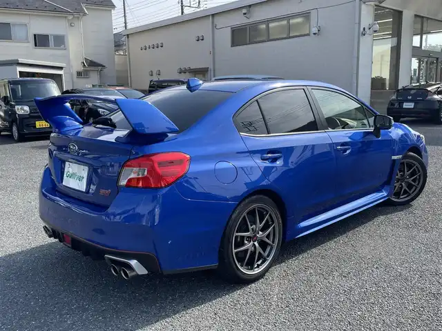 スバル ＷＲＸ ＳＴＩ STI タイプS 青森県 2015(平27)年 7.5万km WRブルーパール ・タイミングベルトＲ７年６月交換済み/・社外ナビ/・フルセグTV/・ETC/・アドバンスパッケージ//ハイビームアシスト//リアビークルデテクション//サイドカメラ/・バックカメラ/・大型リアウィング/・プッシュスタート/・スマートキー×２/・ハーフレザーシート/・パワーシート/・オートライト/・フォグライト/・ウィンカーミラー/・純正18インチアルミ/・純正サスペンション/・社外フロアマット/・社外マフラー積込み