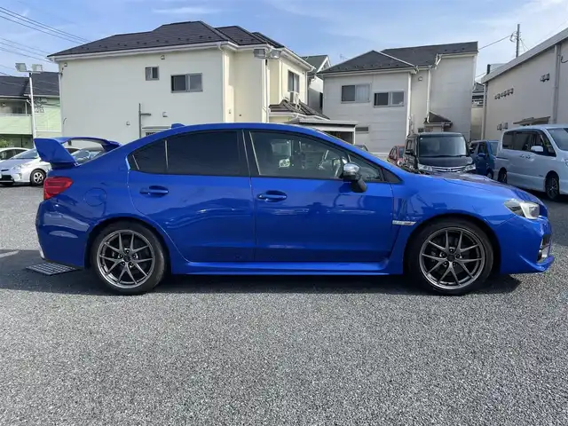 スバル ＷＲＸ ＳＴＩ STI タイプS 青森県 2015(平27)年 7.5万km WRブルーパール ・タイミングベルトＲ７年６月交換済み/・社外ナビ/・フルセグTV/・ETC/・アドバンスパッケージ//ハイビームアシスト//リアビークルデテクション//サイドカメラ/・バックカメラ/・大型リアウィング/・プッシュスタート/・スマートキー×２/・ハーフレザーシート/・パワーシート/・オートライト/・フォグライト/・ウィンカーミラー/・純正18インチアルミ/・純正サスペンション/・社外フロアマット/・社外マフラー積込み