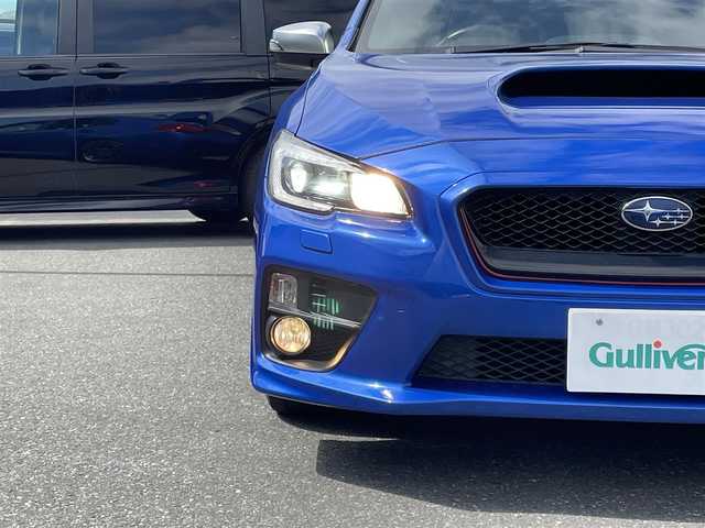 スバル ＷＲＸ ＳＴＩ STI タイプS 青森県 2015(平27)年 7.5万km WRブルーパール ・タイミングベルトＲ７年６月交換済み/・社外ナビ/・フルセグTV/・ETC/・ブラインドスポットモニター/・バックカメラ/サイドカメラ/・大型リアウィング/・プッシュスタート/・スマートキー×２/・ハーフレザーシート/・パワーシート/・オートライト/・フォグライト/・ウィンカーミラー/・純正18インチアルミ/・純正サスペンション/・社外フロアマット/・社外マフラー積込み