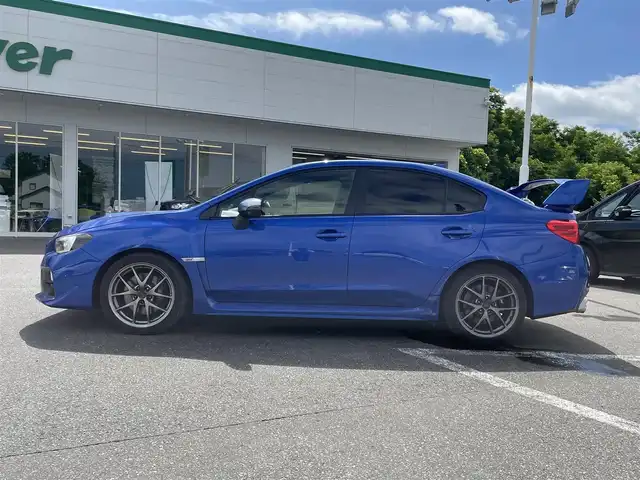 スバル ＷＲＸ ＳＴＩ STI タイプS 青森県 2015(平27)年 7.5万km WRブルーパール ・タイミングベルトＲ７年６月交換済み/・社外ナビ/・フルセグTV/・ETC/・ブラインドスポットモニター/・バックカメラ/サイドカメラ/・大型リアウィング/・プッシュスタート/・スマートキー×２/・ハーフレザーシート/・パワーシート/・オートライト/・フォグライト/・ウィンカーミラー/・純正18インチアルミ/・純正サスペンション/・社外フロアマット/・社外マフラー積込み