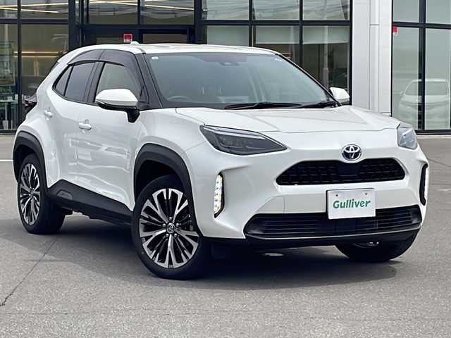 トヨタ ヤリスクロス ハイブリッド Z 青森県 2021(令3)年 2万km ホワイトパールクリスタルシャイン ・4WD/・寒冷地仕様/・純正ディスプレイオーディオ/・Bluetooth/・バックカメラ/・衝突軽減ブレーキ/・レーンキープアシスト/・インテリジェンスクルーズコントロール/・ワイパーデアイサ/・コーナーセンサー（前後）/・オートライト/・オートマチックハイビーム/・LEDヘットライト/・ダウンヒルコントロールアシスト/・プッシュスタート/・スマートキー/・スペアキー1本/・デジタルインナーミラー/・ドライブレコーダー（前後）/・シートヒーター（D＋N）/・ビルドインETC/・社外AWスタットレスタイヤ積込/・純正AW18/・純正フロアマット/・純正ドアバイザー