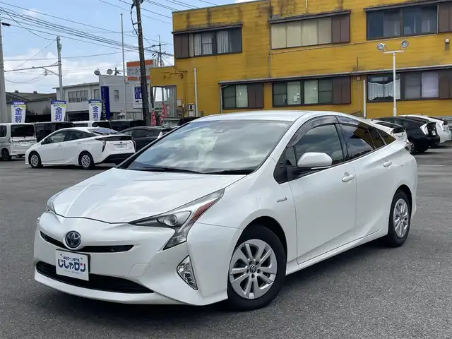 トヨタ プリウス Sセーフティプラス 佐賀県 2018(平30)年 12.7万km ホワイトパールクリスタルシャイン （株）IDOMが運営する【じしゃロン佐賀店】の自社ローン専用車両になります。/こちらは現金またはオートローンご利用時の価格です。自社ローンご希望の方は別途その旨お申し付けください/・純正ＳＤナビ/フルセグ/ＢＴオーディオ/バックカメラ　　/ＤＶＤ/ＣＤ　/・純正ドライブレコーダー　/・純正ＥＴＣ