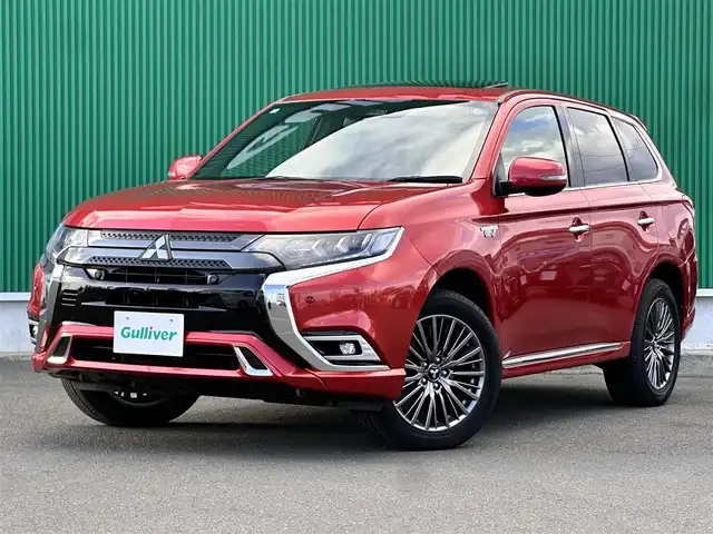 三菱 アウトランダー ＰＨＥＶ Sエディション 宮城県 2018(平30)年 9.4万km レッドメタリック ロックフォードフォズゲートプレミアムサウンドシステム/e-Assist追加機能/・後側方車両検知警報/・後退時車両検知警報/＝＝＝/4WD/サンルーフ/e-Assist/・衝突被害軽減ブレーキ/・車線逸脱警報/・レーダークルーズコントロール/・誤発進抑制機能/純正ディスプレイオーディオ/【Bluetooth/USB/IPOD】/マルチアラウンドモニター/電動リアゲート/ビルシュタイン製ダンパー/レザーシート/パワーシート【前席】/シートヒーター/ハンドルヒーター/パドルシフト/LEDヘッドライト/S-AWC/純正18インチAW/W/サイド/カーテン/ニーエアバッグ/保証書/取扱説明書
