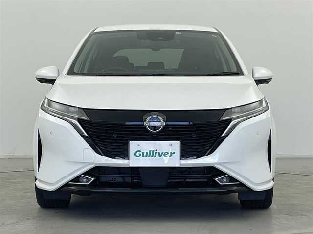 日産 オーラ G レザーエディション 群馬県 2021(令3)年 1万km ピュアホワイトパール 純正7インチナビ/(AM/FM/Bluetooth/TV/iPod)/インテリジェントアラウンドビューモニター/インテリジェントルームミラー/純正ナビ連動ドライブレコーダー(前後)/ブラインドスポットワーニング/アダプティブヘッドライト/セーフティシールド（インテリジェントLI）/電動パーキングブレーキ/オートブレーキホールド/インテリジェントエマージェンシーブレーキ/フロント/バックソナー/ステアリングスイッチ