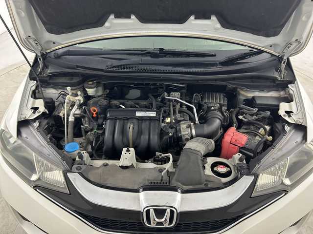 ホンダ フィット 13G Fパッケージ 愛知県 2016(平28)年 6.4万km プレミアムホワイトパールⅡ 禁煙車/純正7インチナビ/(CD/DVD/AM/FM/Bluetooth/ワンセグTV）/バックカメラ/ETC/前方ドライブレコーダー/スマートキー/プッシュスタート/純正フロアマット/横滑り防止装置/ステアリングスイッチ/オートエアコン/ドアバイザー