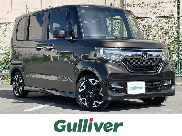 ホンダ Ｎ ＢＯＸ 東京都 2019(令1)年 3.6万km プレミアムグラマラスブロンズP ホンダセンシング/（オートハイビーム、歩行者事故低減ステアリング、ACC）/KENWOODナビ/（BT、TV）/ターボ車/両側パワスラ/コーナーセンサー/ステアリングスイッチ/オートLED/バックカメラ/ビルドインETC/ハーフレザー（バーガンディーアクセント）/LEDルームランプ/横滑り防止装置/レーンキープA/追突被害軽減ブレーキ/社外フロアマット/SRSエアバック/プッシュエンジンスタート/スマートキーシステム